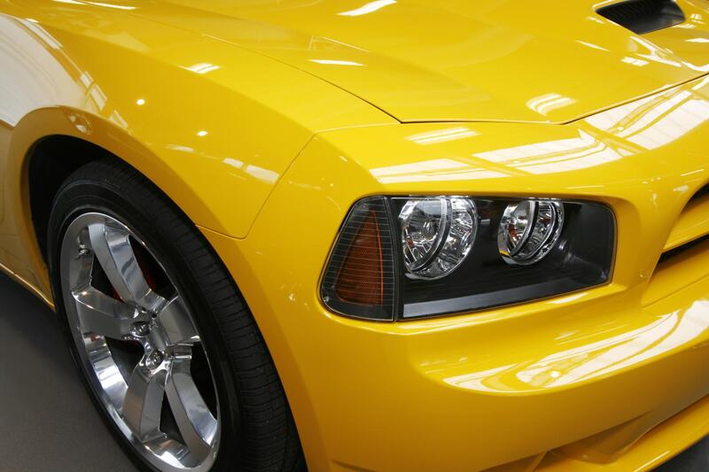 Picture of a yellow car with paint protection 